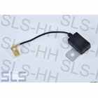 Interference suppression capacitor with flat plug